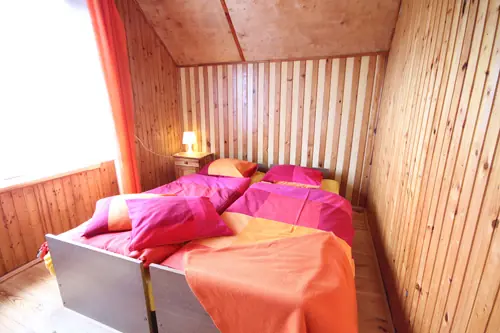Sypialnia w Domu Letniskowym Nela w Rowach, widok 1