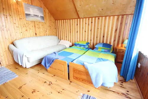 Sypialnia w Domu Letniskowym Nela w Rowach, widok 5