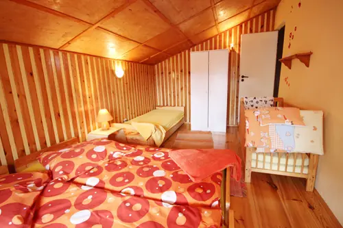 Sypialnia w Domu Letniskowym Nela w Rowach, widok 8